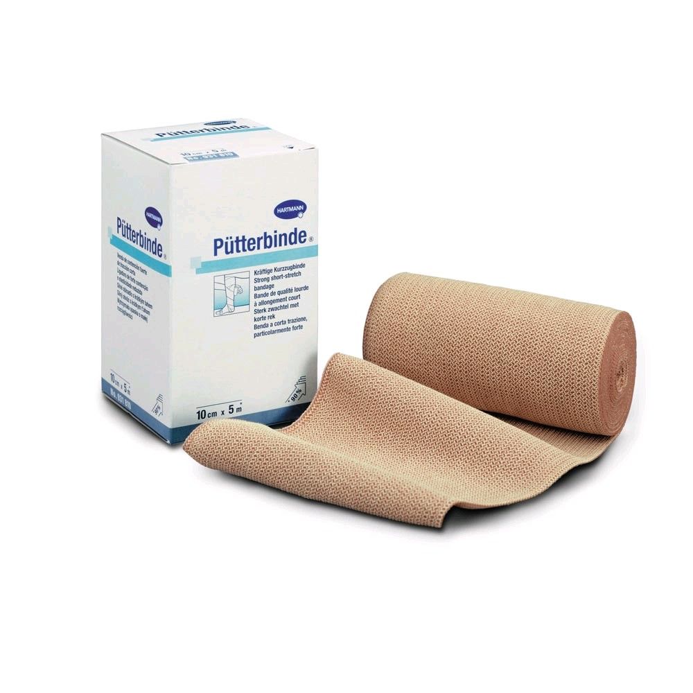 Kurzzugbinde als beige Rollenware mit ausgerolltem Bandabschnitt