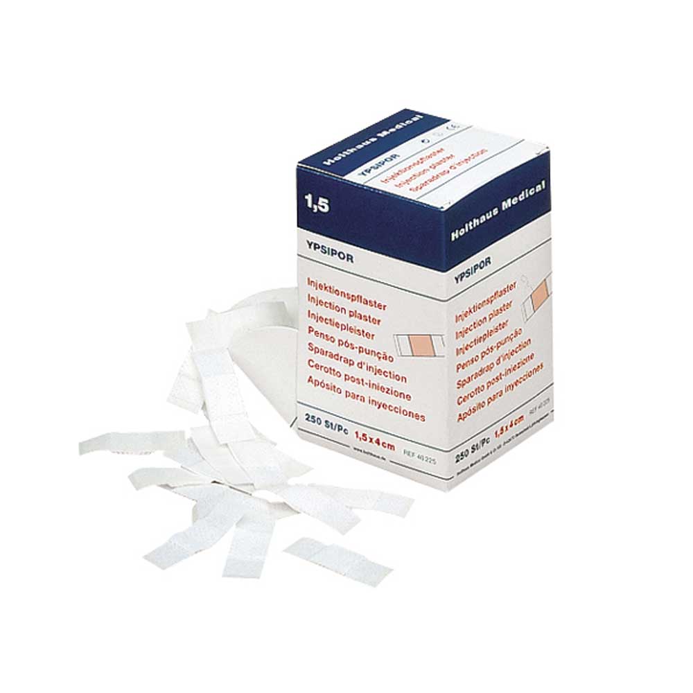 Holthaus Medical YPSIPOR Injektionspflaster mit freiliegenden weißen Pflastern vor der Packung