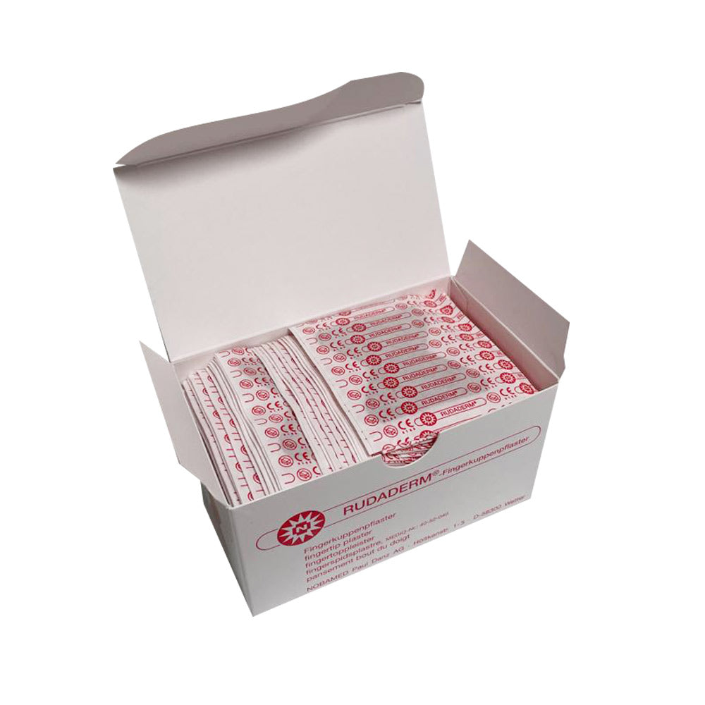 Geöffnete Fingerkuppenpflaster-Box mit eingelagerter Packung aus roten Pflasterstreifen